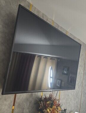 Wall-Mount Black Flat Panel LG TV -